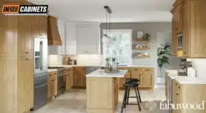 Honey oak shaker cabinets paired with white quartz countertops in a modern two-tone kitchen with stainless steel appliances and open shelving