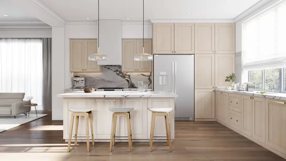 The same rendered open plan kitchen with the wide shaker cabinets in a pale textured wood look finish: tall cabinets around a stainless steel refrigerator, an island with three wooden stools, a dark veined marble backsplash and two glass pendant lights.